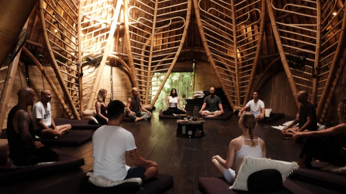 The TBO community gathered in breathwork circle